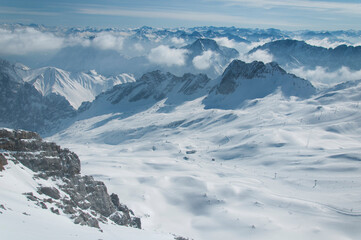 wetterstein mountains and ski slopes in clouds Germany Zugspitze