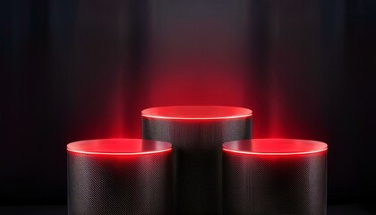 three black cylindrical podiums illuminated by red neon light
