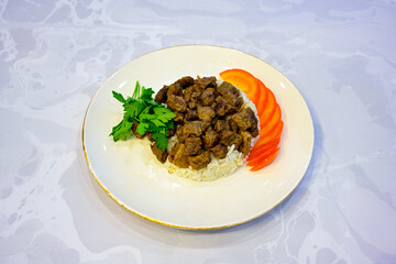 Lavash zurna doner kebab ( zurna  durum )  or shawarma sliced in plate isolated.  hatay usulu tavuk Et doner durum. Gobit ekmek arasi doner. Pilavustu iskender doner kebap. 