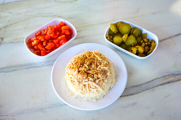 Traditional delicious Turkish food; Turkish style rice pilaf (Turkish name; Arpa sehriyeli. tavuk, kuru fasulyeli, pirinc pilavi). Cigerli, kavurmali, tereyagli nohut pilav.
