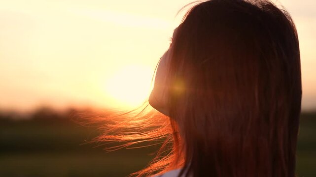 face person outdoors, woman face look up serenity silhouette, relax nature pleasure, beautiful girl with red hair wind looking sunset, evening thoughts, dreaming twilight, people happiness dream face