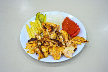 Lavash zurna doner kebab ( zurna  durum )  or shawarma sliced in plate isolated.  hatay usulu tavuk Et doner durum. Gobit ekmek arasi doner. Pilavustu iskender doner kebap. 
