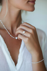 Elegant woman showcasing diamond necklace matching sparkling engagement ring. Close-up of elegance, sparkling jewelry including necklace and a diamond ring. Luxury jewelry