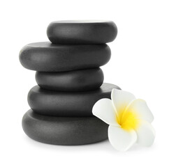 Spa stones with flower isolated on white