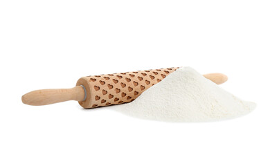 Patterned wooden rolling pin and pile of flour isolated on white