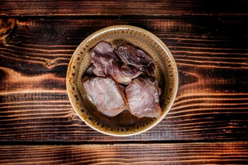 Mix of Seafood Jerky in Bowl, Top View - Gourmet snack, Overhead studio shot
