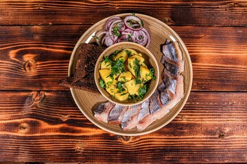 Top-Down Herring and potatoes, studio shot- Top view, shot of the popular Slavic cuisine and potato-based dishes to restaurant.