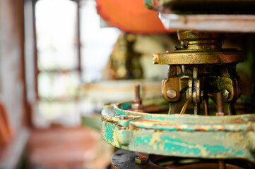 Intricate craftsmanship of antique hat making machines revealing historical artistry and time-honored techniques within a vintage workshop