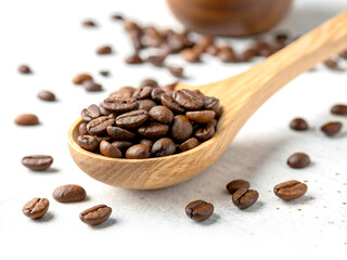 Obraz premium Scoop of coffee beans in a bag on white background. Coffee in scoop isolated. Top view of coffee