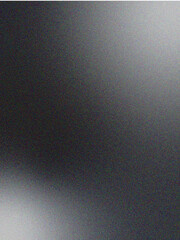 White and black abstract background with a dark, grainy noise texture, ideal for mobile header covers, wallpapers, and backdrop designs.