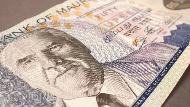 The Mauritian national currency, 50 Rupee, close-up with a sliding motion.