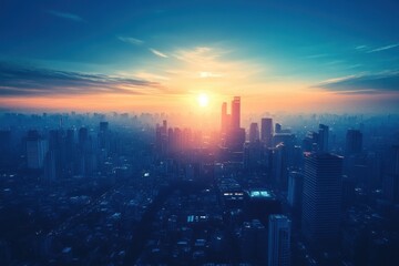Fototapeta premium Cityscape view at sunrise with bright sun over skyscrapers