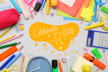 Frame made of alarm clock and different stationery on grey background
