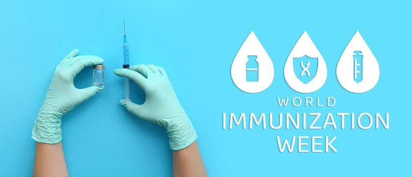 Female doctor with medical syringe on blue background