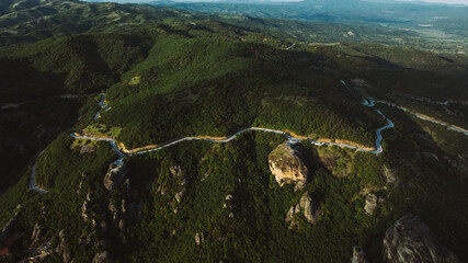 Aerial view of Meteora Monasteries in Greece. Magnificent monasteries of Meteora on the rocks at sunset