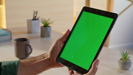 Entrepreneur reading data mockup tablet at office closeup. Serious executive