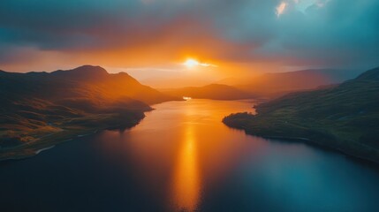 Fototapeta premium Sunset over mountain lake, aerial view, dramatic clouds, travel poster