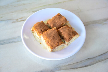 Turkish Dessert Sobiyet, havuc dilimi, midye baklava, mussels baklava and classic baklava with Pistachio . Cikoltali cevizli, fistikli soguk Baklava, top view.