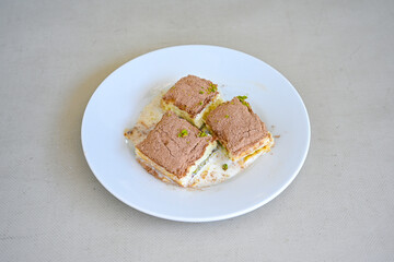 Turkish Dessert Sobiyet, havuc dilimi, midye baklava, mussels baklava and classic baklava with Pistachio . Cikoltali cevizli, fistikli soguk Baklava, top view.