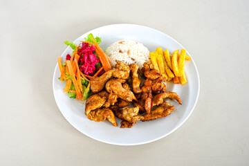 Chicken wings barbeque in a dish with BBQ grill sauce . Izgara tavuk kelebek sis kanat. Izgara tavuk sis, gogus.