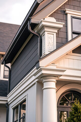 Elegant Home Exterior: Classic Architecture and Modern Design. Discover the beauty of this luxury house with exquisite details, columns, and a stunning facade.