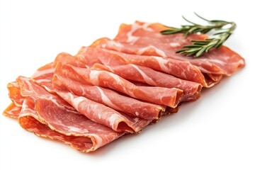 Obraz premium Thinly sliced Spanish ham arranged neatly on a surface, accompanied by a sprig of fresh rosemary for added flavor and presentation