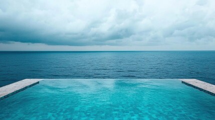 Fototapeta premium Relaxing infinity pool overlooking calm ocean coastal retreat photography serene atmosphere wide angle viewpoint tranquility and escape