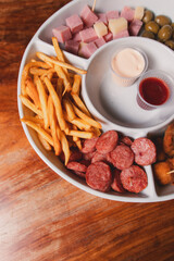 Detail view of various snacks on a large tray.