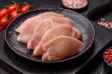 Raw chicken or turkey fillet cut into slices with salt, spices and herbs