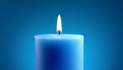 a blue candle on a blue background with a lit candle within the middle is a unmarried blue candle