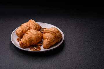 Sweet crispy croissants with chocolate filling