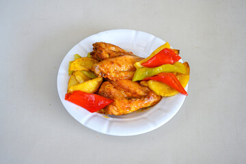 Chicken wings barbeque in a dish with BBQ grill sauce . Izgara tavuk kelebek sis kanat. Izgara tavuk sis, gogus.
