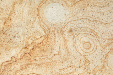 Texture of beige stone surface as background