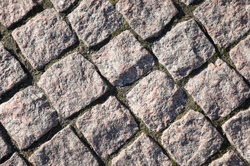 Texture of grey paved road as background