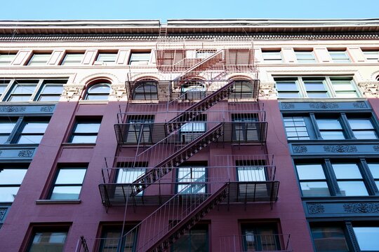 Red and Green Building with Fire Escape (New York, New York, USA)
 - Powered by Adobe