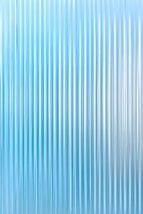 Obraz premium Abstract background with reeded ribbed glass effect texture
