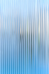 Obraz premium Abstract background with reeded ribbed glass effect texture