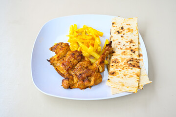 Chicken wings barbeque in a dish with BBQ grill sauce . Izgara tavuk kelebek sis kanat. Izgara tavuk sis, gogus.