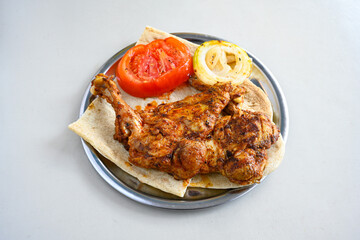 Chicken wings barbeque in a dish with BBQ grill sauce . Izgara tavuk kelebek sis kanat. Izgara tavuk sis, gogus.