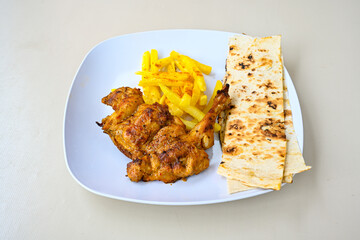 Chicken wings barbeque in a dish with BBQ grill sauce . Izgara tavuk kelebek sis kanat. Izgara tavuk sis, gogus.