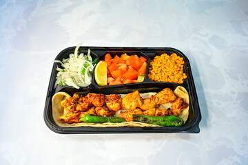 Chicken wings barbeque in a dish with BBQ grill sauce . Izgara tavuk kelebek sis kanat. Izgara tavuk sis, gogus.