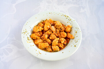 Sauteed chicken with carrots and peas . Turkish ; Tavuk Sote 