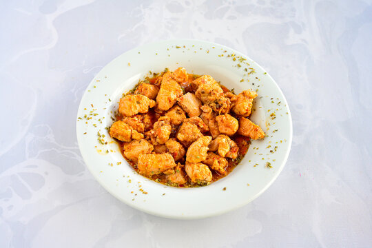 Sauteed chicken with carrots and peas . Turkish ; Tavuk Sote 