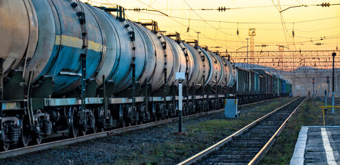 Transportation industry. LNG, gasoline and oil tanks. Railway Station with trains