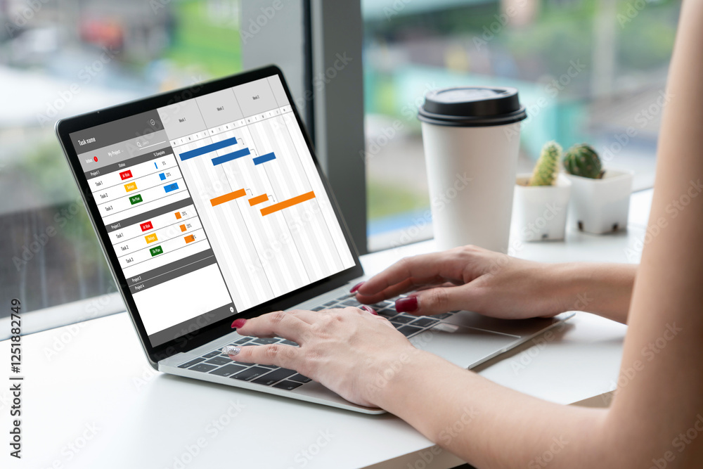 Aufkleber project planning software for modish business project management on the computer screen showing time