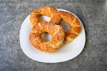Turkish pastry product , tasty pogaca, acma . Simit, gevrek. Turkish Pastries; peynirli, patatesli, kasarli pogaca, sosili acma, dereotlu pogaca,  borek, acma, ay coregi at patisserie showcase.