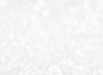 White and gray bokeh background. Photo can be used for the concepts of New Year, Christmas, Wedding Anniversary and all celebrations.