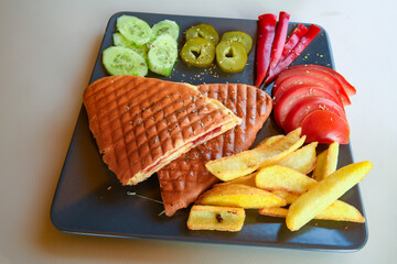 Turkish karisik atom Ayvalik tost ( kasarli bazlama tost) . Sucuklu, Kasarli, kavurmali karisik...
