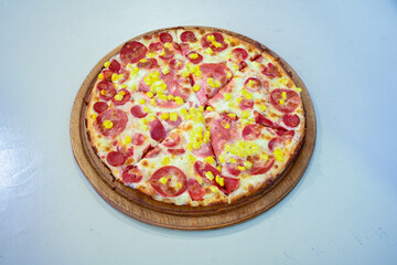 Traditional Turkish cuisine. Pizza, pita, pidesi, sucuk, hummus, kebab. Many dishes on the table. Serving dishes in restaurant. Mix, formaggi, veggie pizza. Top view, flat lay