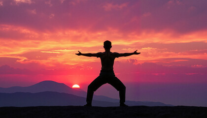 Fototapeta premium Lone person practicing yoga at vibrant sunrise, renewal and mindfulness